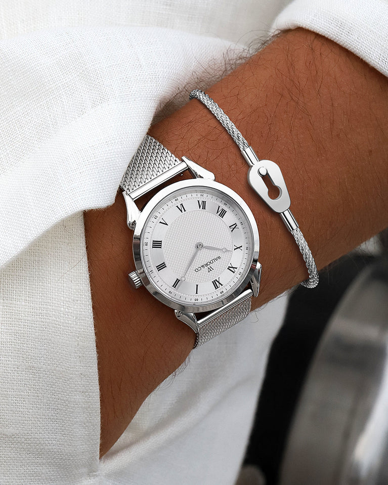 A round watch in silver from Waldor & Co. with blue sunray patterned dial. Ronda movement. The model is Original 40 Côte d'Azur 40mm.