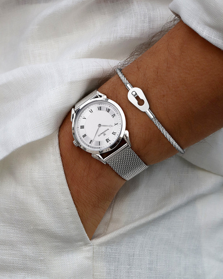 A round watch in silver from Waldor & Co. with blue sunray patterned dial. Ronda movement. The model is Original 40 Côte d'Azur 40mm.