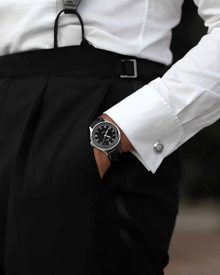 A round Automatic mens watch in Rhodium-plated 316L stainless from Waldor & Co. with black double-layered dial in copper. Curved mineral glass with anti-reflective coating. Miyota 9093 movement. Genuine leather strap. The model is Continual 39 Amalfi.