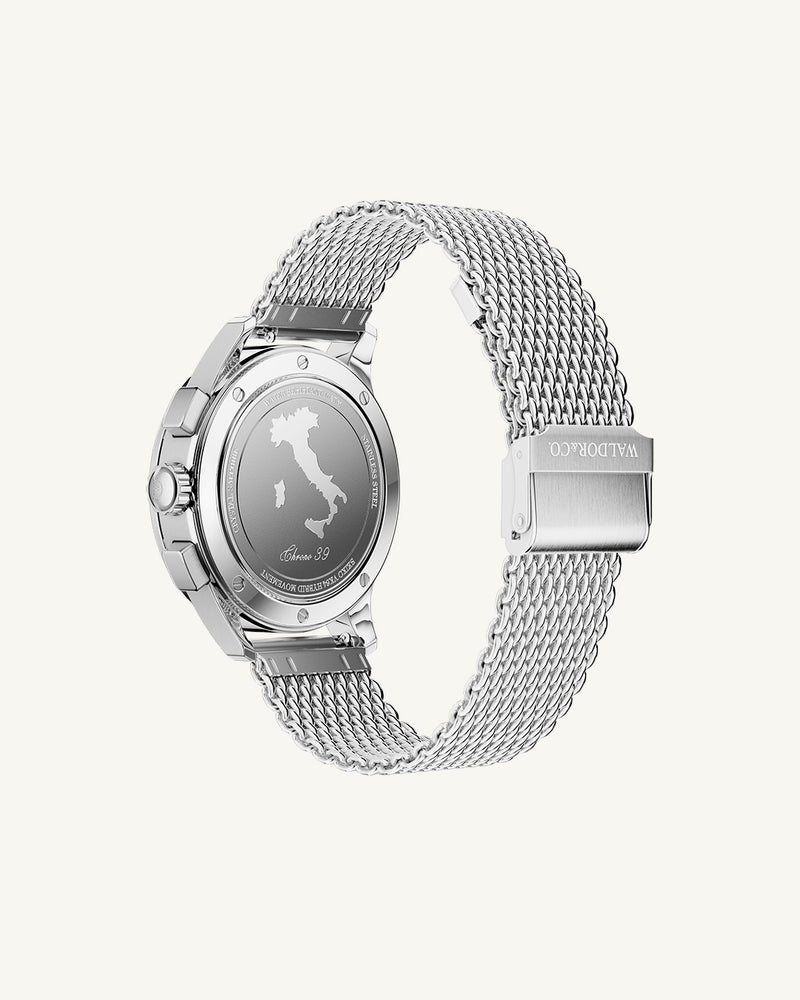 A round mens watch in rhodium-plated silver from Waldor & Co. with deep-green sunray dial and a second hand. Seiko movement. The model is Chrono 39 Sardinia 39mm.