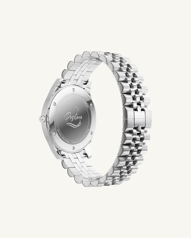 A round womens watch in silver from Waldor & Co. with green sunray dial and a second hand. Seiko movement. The model is Imperial 32 Positano 32mm.