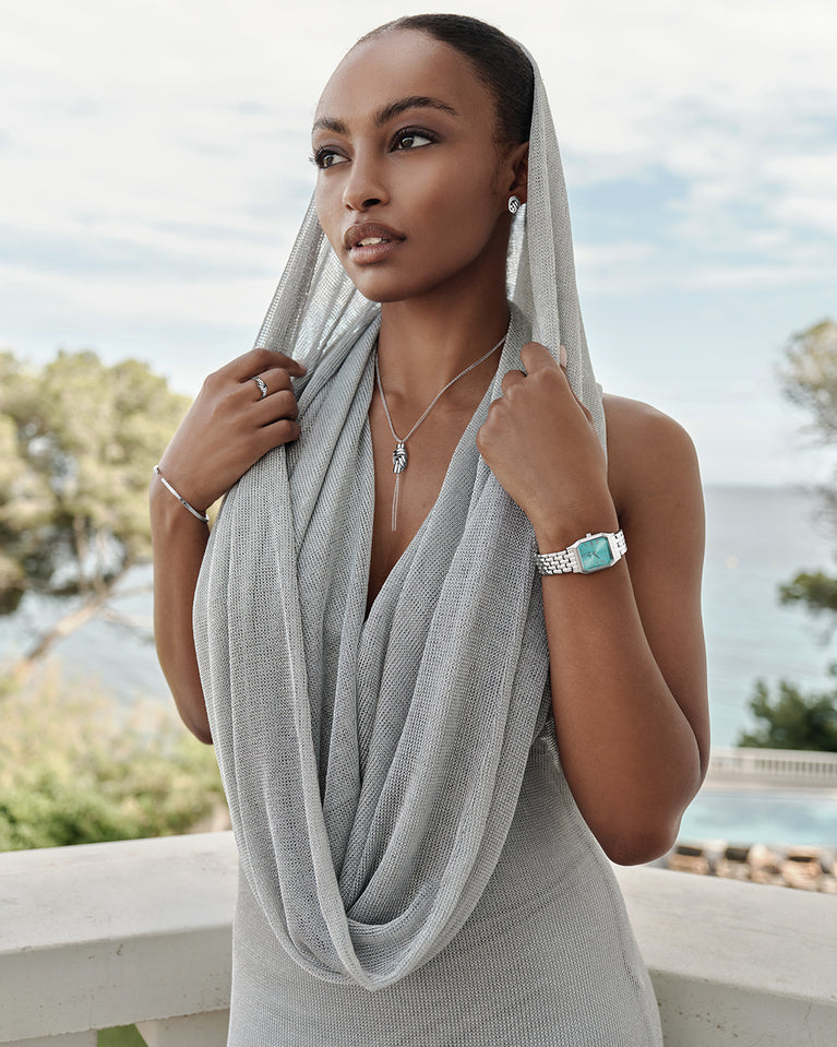 Earrings in silver plated-316L stainless steel from Waldor & Co. The model is Dual Knot Earring Polished.