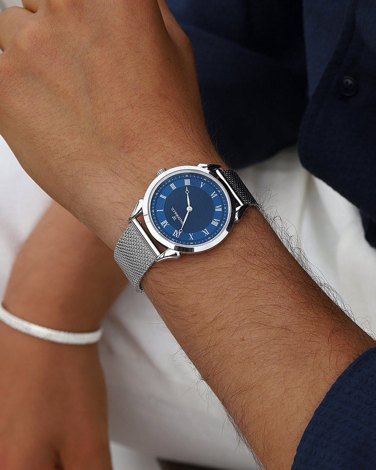 A round watch in silver from Waldor & Co. with blue sunray patterned dial. Ronda movement. The model is Original 40 Côte d'Azur 40mm.