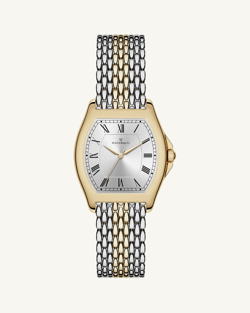 A square womens watch in 22k two-toned silver and gold plated 316L stainless steel from Waldor & Co. with domed mineral glass dial. Seiko movement. The model is Constant 36 Menaggio.