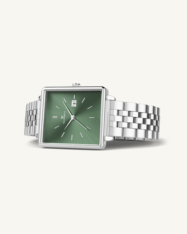 A square womens watch in silver from WALDOR & CO. with green sunray dial and a second hand. The model is Delight 32 Chelsea 28x32mm.