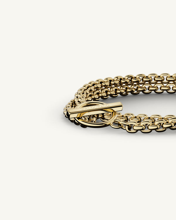 A 14-k gold plated stainless steel chain in silver from WALDOR & CO. The model is Dual Chain Polished.
