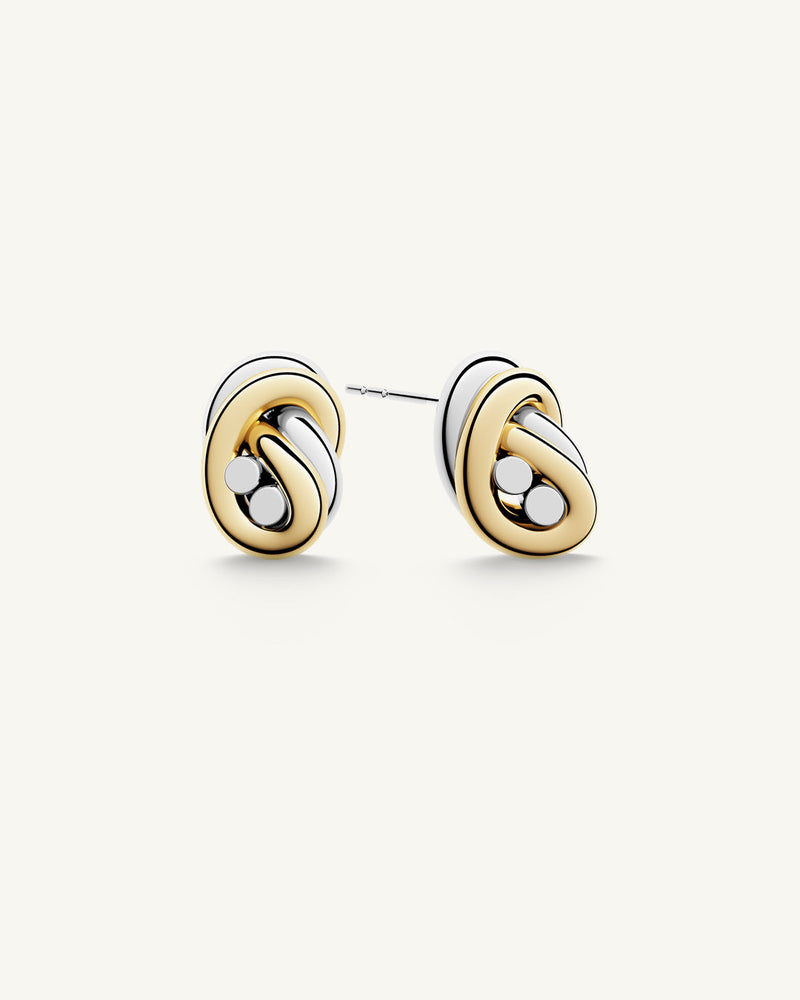 A polished stainless steel earrings in 14k gold from Waldor & Co. One size. The model is Dual Knot Ring.