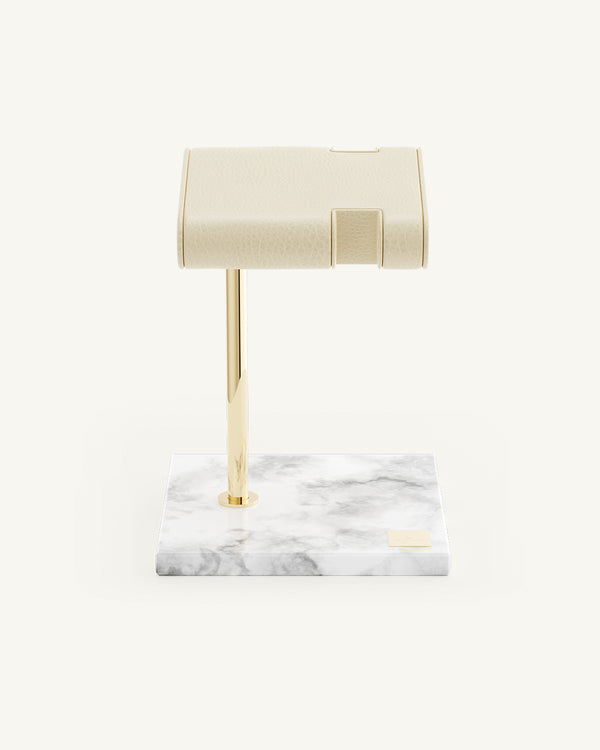 A Watch Stand in 14k gold-plated stainless steel and marble from Waldor & Co. The model is Watch Stand.