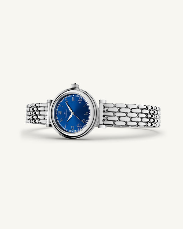 A round womens watch in Rhodium-plated 316L stainless steel from Waldor & Co. with blue Sapphire Crystal glass dial. Seiko movement. The model is Venia 24 Villefranche.