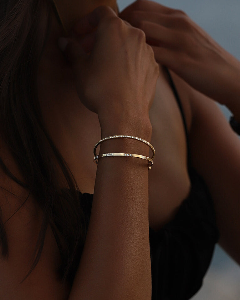 A Bangle in 14k gold-plated 316L stainless steel from Waldor & Co. One size. The model is Dulcet Bangle Polished.